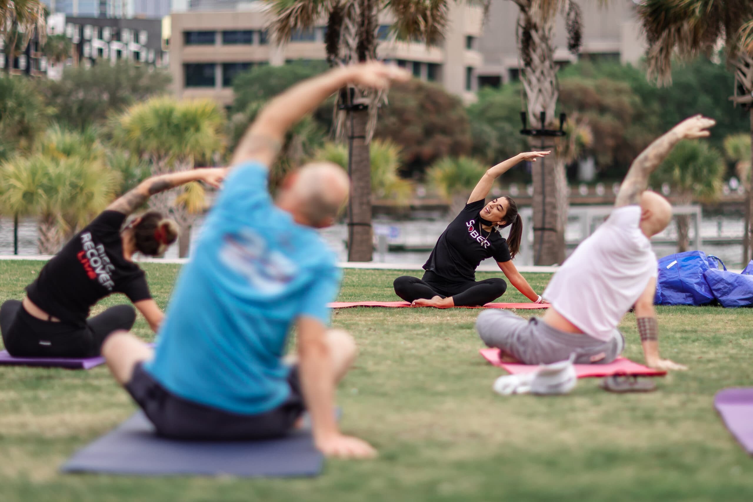 Group doing outdoor yoga.